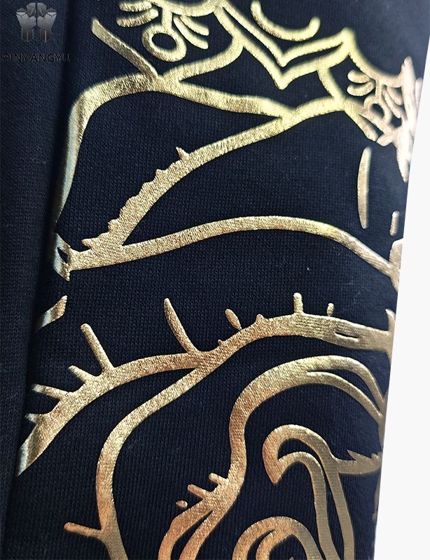 Calças com design de strass e estampagem dourada